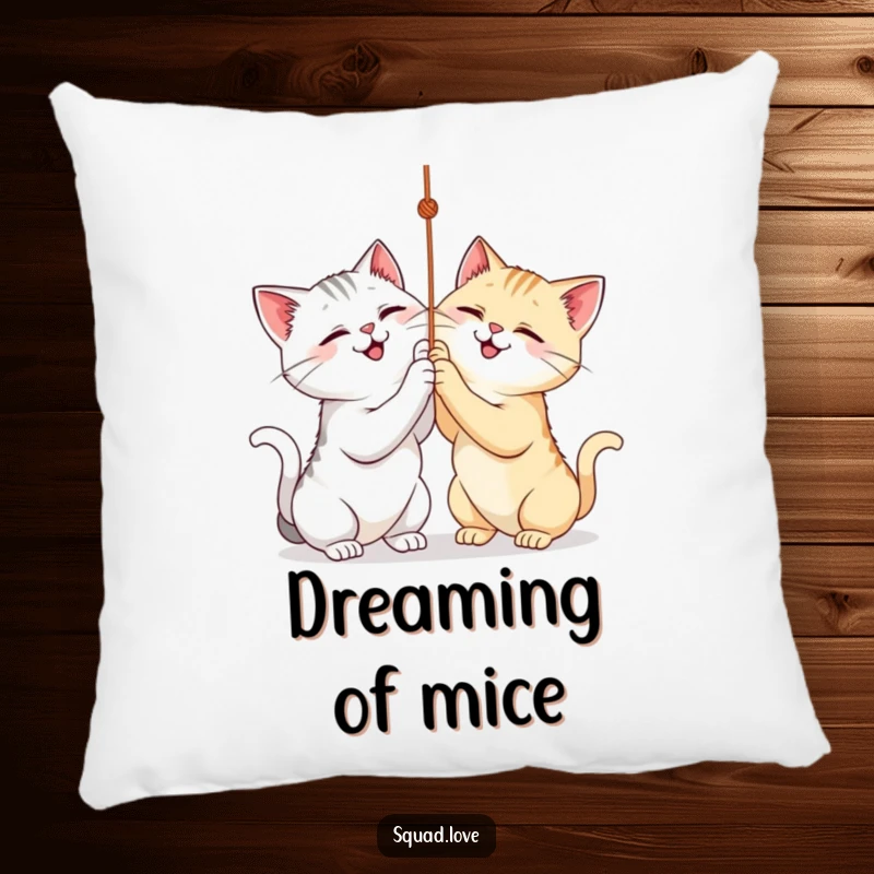 Funny pillow showcasing two happy cats playfully batting at a dangling string, bringing comfort and laughter.