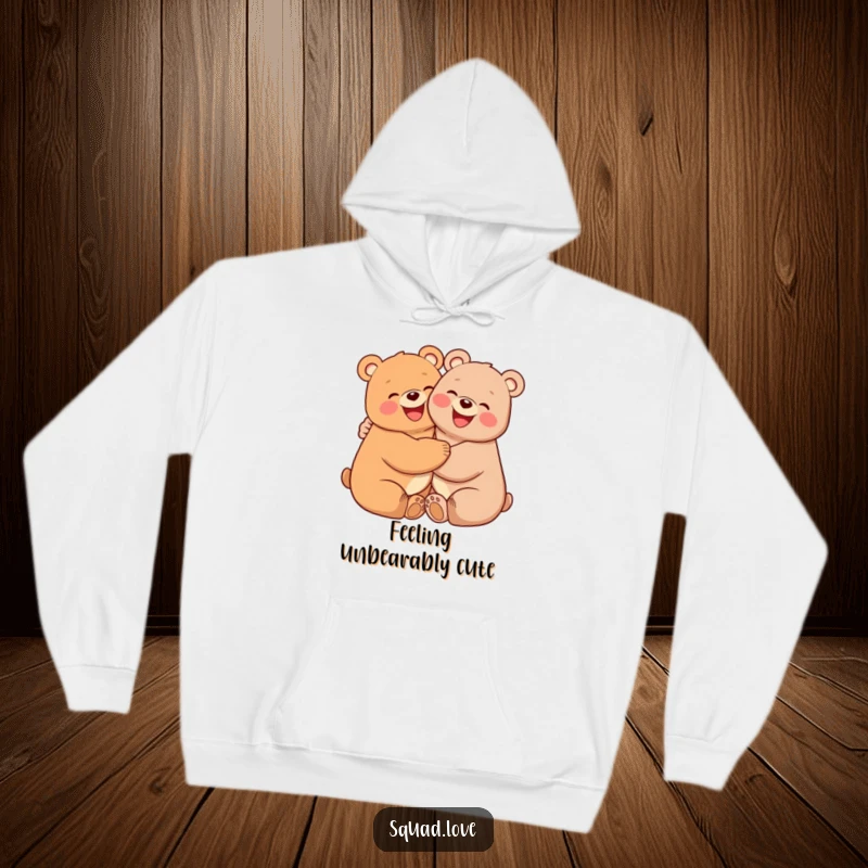 Funny hoodie showcasing two cheerful, round-faced bears with pink cheeks, hugging each other warmly, radiating comfort and delightful friendship.